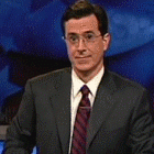 Colbert-throwing-gansta-sign.gif